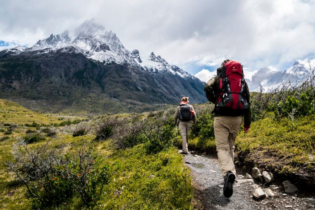 hiker on trail with waterproof hiking boots Merrell